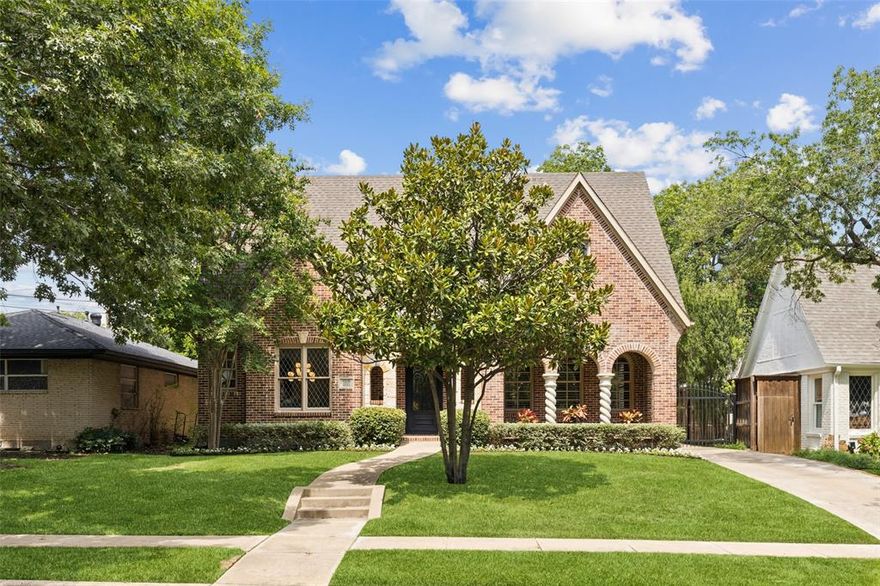 Located in the coveted Mockingbird Elementary attendance zone, this 2013 J. Gregory-built home blends classic Dallas charm with modern functionality. A formal entry opens to an elegant dining room and a private office with custom built-ins. The open-concept design features a chef’s kitchen with quartzite countertops, double ovens, gas range, butler’s pantry with ice maker, and a large walk-in pantry—all overlooking a light-filled breakfast room and living room with a wall of windows, fireplace and a stylish wet bar. The first floor also includes a guest suite with a full bath, while upstairs offers a spacious game room with wet bar and wine storage, along with a utility room with sink and walk-in attic access. The luxurious primary suite boasts marble tile, jetted tub, separate shower with dual shower heads, and an oversized walk-in closet. Two additional bedrooms share a Jack-and-Jill bath. Designed for year-round enjoyment, the backyard is fully turfed and features a putting green, covered patio with fireplace, and a built-in grill station. A detached two-car garage with electric gate completes this thoughtfully designed property.