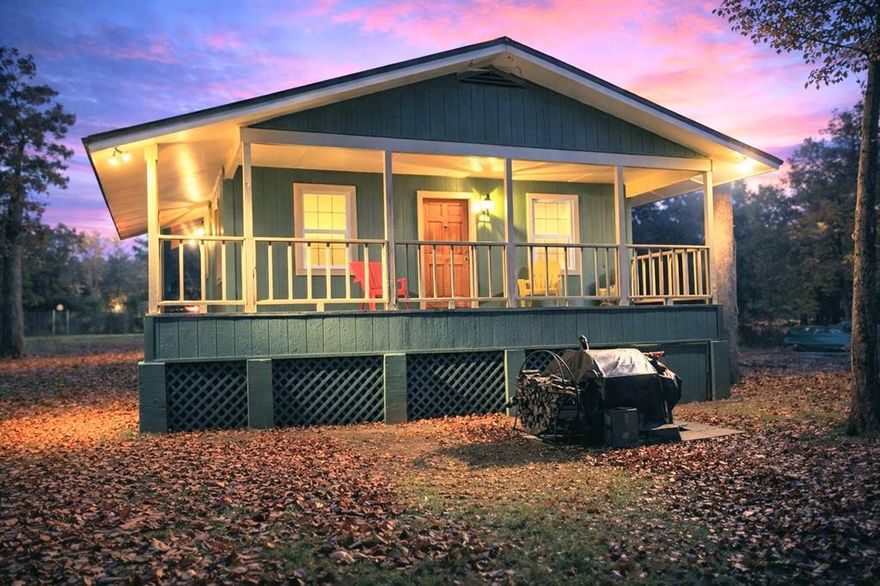 Your Cedar Creek lake house awaits, where peaceful water views, a covered dock, and a conveying 232 Islander Baja boat set the stage for instant lake enjoyment.

This furnished waterfront retreat is a fantastic opportunity to step right into lake living—whether you’re dreaming of weekend getaways, full-time relaxation, or a short-term rental investment. Located in a welcoming lake community with access to a private boat ramp, community pool, and tennis courts, the home invites a relaxed pace and easy connection to the water.

Enjoy quiet mornings and sunset evenings on the covered deck, taking in tranquil lake views and refreshing breezes. Lovingly owned and built by the original owner, the home showcases exceptional craftsmanship and thoughtful details throughout. The efficient 2-bedroom, 1-bath layout is perfectly suited for easy, low-maintenance lake living.

Outdoor features include a covered dock with lift and new lift cables, ready for days on the water. The 232 Islander Baja boat conveys, along with water skis and fishing gear—making it easy to begin enjoying Cedar Creek immediately. Also conveying with the property are a bunk bed, living room furniture, kitchen table and chairs, Tracker lawn mower, refrigerator, washer and dryer, and multiple additional items, creating a rare turn-key lake opportunity. See MLS for full list of conveying items.

Two separate buildings with electricity and lofts add valuable flexibility. A 16x12 workshop provides excellent space for projects and storage, with the option to accommodate equipment or a vehicle if desired. A 12x10 insulated storage building offers ideal space for lake gear or the potential to create an outdoor entertaining area.

Whether you’re cruising the lake, hosting friends, or simply enjoying the peaceful rhythm of life on Cedar Creek, this home is ready for you to start making lake memories right away.