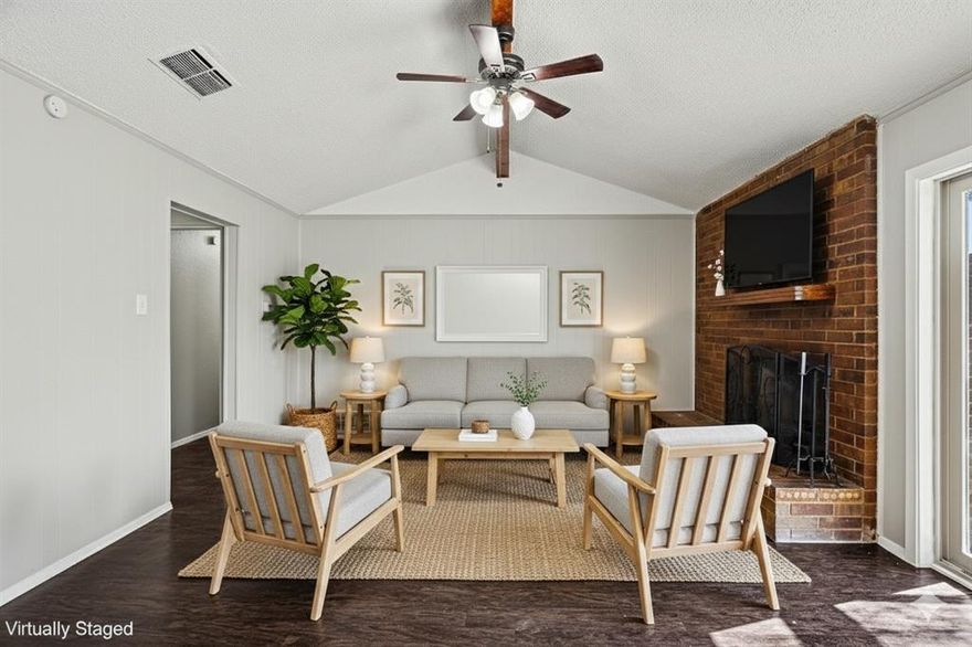 Discover timeless charm in the heart of Watauga, where comfort and convenience promote vibrant possibilities. As you step inside, an open-concept warmly welcomes you into the living area featuring a cozy wood-burning fireplace and luminous views of the spacious backyard that extends into the dining and kitchen—a beautiful blueprint ready for custom creations. The primary suite provides a peaceful retreat, complete with a large walk-in closet and en-suite bathroom, an owner's tranquil sanctuary. Step outside to a sprawling backyard that backs up to a creek, a perfect backdrop for outdoor entertainment, with added privacy and mature trees—a serene setting you'll enjoy year-round. Located in a quiet community close to parks, shopping, and dining, with effortless access to major highways, this home is not just move-in ready—it's a foundation for your new beginning. Don't miss out on the opportunity and schedule your showing today!