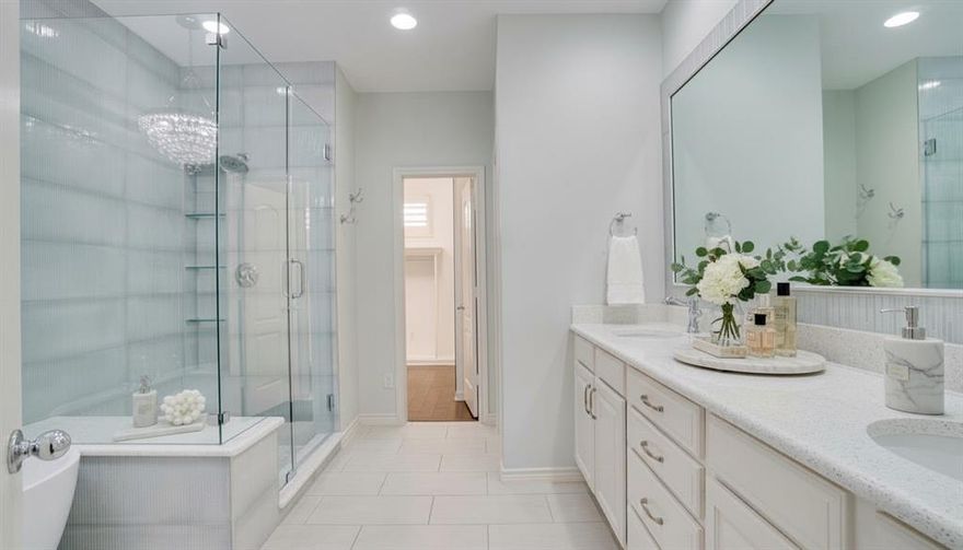 Impeccably updated and effortlessly stylish 2-bedroom, 2.5-bath townhome in the heart of Addison blends modern design with warm, livable comfort. Custom plantation shutters add a refined finish while allowing sunlight to pour through large windows on every level, creating a warm, open feel that highlights the home’s thoughtful upgrades and clean design.

The first floor offers a private guest suite with an en-suite bath perfect for visitors, a home office, or a quiet retreat. 

Upstairs, the main living level offers an airy, open concept layout where the kitchen, dining, and living spaces flow seamlessly together. The remodeled kitchen is a true showstopper (featuring sleek quartz counters, custom cabinetry with added storage, designer backsplash, and stainless steel appliances) and flows seamlessly into the dining and living areas, creating a perfect space for entertaining and everyday living.
The third floor is dedicated to the serene and spacious primary suite where luxury meets practicality. A beautiful spa-inspired en suite bath showcases a soaking tub, glass-enclosed shower, and a statement chandelier that adds a touch of glamour, while the custom-designed closet elevates organization to an art form.

With abundant built-in storage, a two-car garage, and a private patio for morning coffee or evening unwinding, this home checks every box. Ideally located near Addison Circle’s dining, shopping, and parks, it delivers low-maintenance living without compromising style or substance.