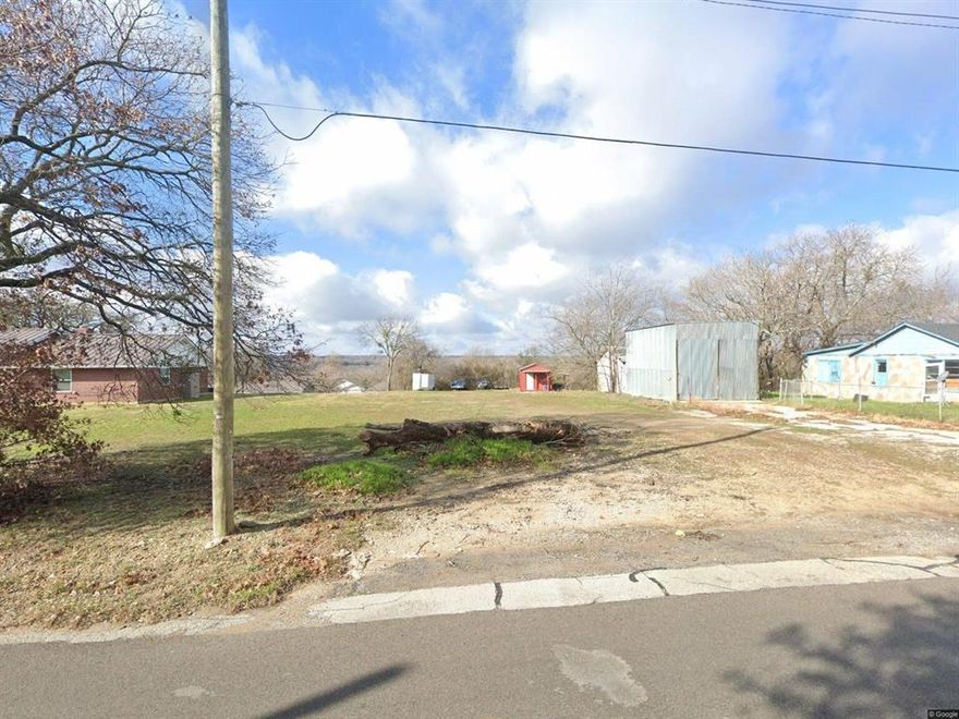 Just under a half acre, flat land with a downtown view.   Iminage your home sitting here.