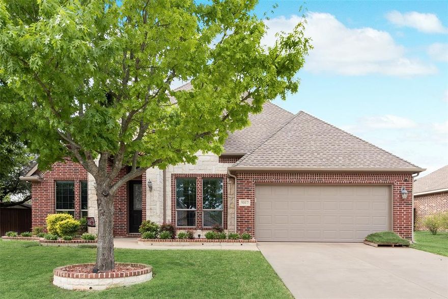 Welcome home to 5017 W Fall Drive in Midlothian's sought-after Rosebud community, where quality craftsmanship meets everyday convenience!
This meticulously maintained 4-bedroom, 2-bath traditional home, built in 2011, offers 2,394 sq ft of thoughtfully designed living space on a generous .219 acre lot. From the moment you step inside, you'll love the rich hand-scraped hardwood floors, soaring vaulted ceilings, and decorative lighting that set the tone for the rest of the home. The heart of the home is a massive kitchen featuring custom cabinetry, granite countertops with deep undermount sinks, stainless steel appliances, and a sunny breakfast room, perfect for busy mornings or casual entertaining. The formal dining room adds elegance for special gatherings. Retreat to the spacious primary suite with a sitting area, garden tub, separate shower, dual vanities, and a walk in closet. Three additional bedrooms also feature walk-in closets, storage is never a concern here! Step outside to your large cedar covered patio complete with sun shades and TV connections, the ultimate outdoor living setup! The backyard is enclosed by an 8-ft cedar board on board privacy fence and includes a 10x14 workshop with electric. Roof and gutters installed November 2019. Average electric bill is only $205. Located just .7 miles from Mt. Peak Elementary, 2.46 miles from Hwy 287, and only 0.26 miles from the community pool, splash pad, fishing pond, and park. Exemplary Midlothian ISD, the elementary school even has a private neighborhood entrance! Don't miss this one.