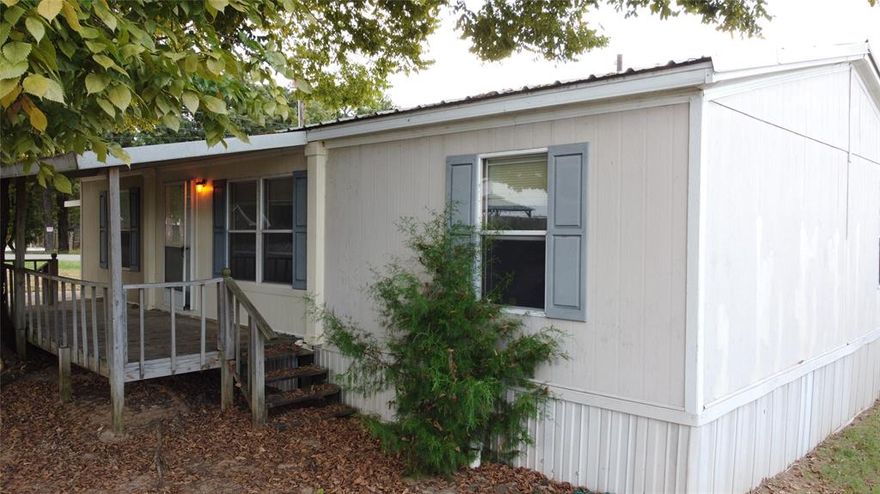 ATTENTION BUYERS!!! This Granbury home is located on the Ft Worth side of town, the three bedroom, two bathroom has a open-floor, split-bedroom home is in the Acton School District, has two boat ramps and easy access to Lake Granbury.  The mature tree in the front yard provides shade for the home and massive, covered porch.  The large corner lot and carport and nice sized shed allow this home to be the perfect home or part-time summer retreat for lake living.  There is an area in front of the shed to park your boat or toys. The backyard is fenced for kiddos or pets. The home has new vinyl flooring in all rooms with the exception of the bathrooms.