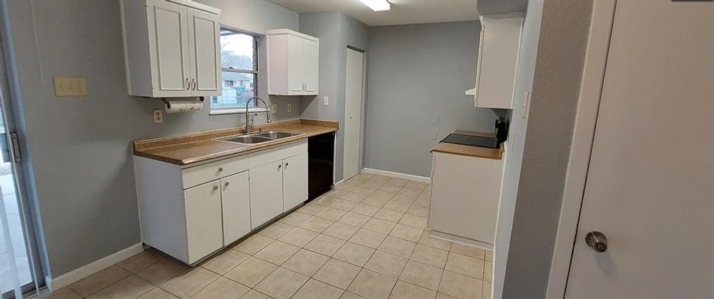 Photo of 313 Georgetown Drive, Garland, TX 75043 (MLS # 21215429)