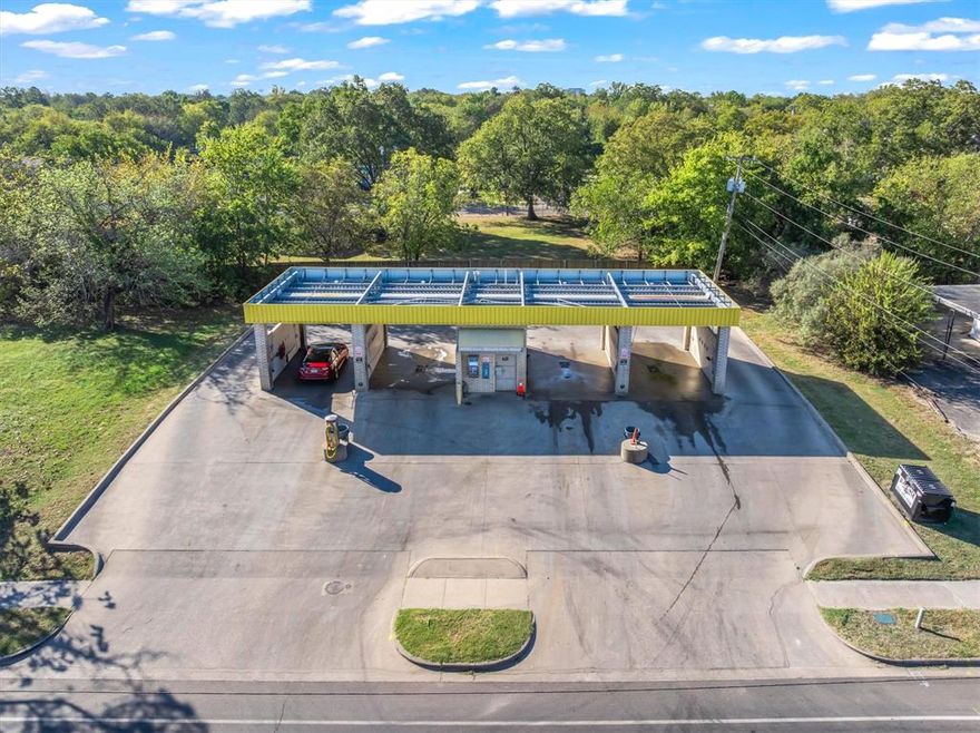 Profitable Turn-key Car Wash Opportunity in Growing Greenville TX! This clean and well maintained 4-bay car wash sits on a busy road less than a half mile from downtown Greenville. Proven cash flow opportunity, with low overhead and easy maintenance. Constructed of durable metal, brick and concrete, it features electronic, digital, credit card payment terminals offer many wash, wax and rinse selections, high pressure hoses, foam brushes in every bay, vacuums, air fresheners, full operating instructions, Change machine and security cameras throughout. Surrounded by both residential neighborhoods and nearby business, it benefits from steady recurring traffic and loyal customers. With everything in place and ready to operate, give it your business name, make it yours and this property offers immediate income-producing opportunity.