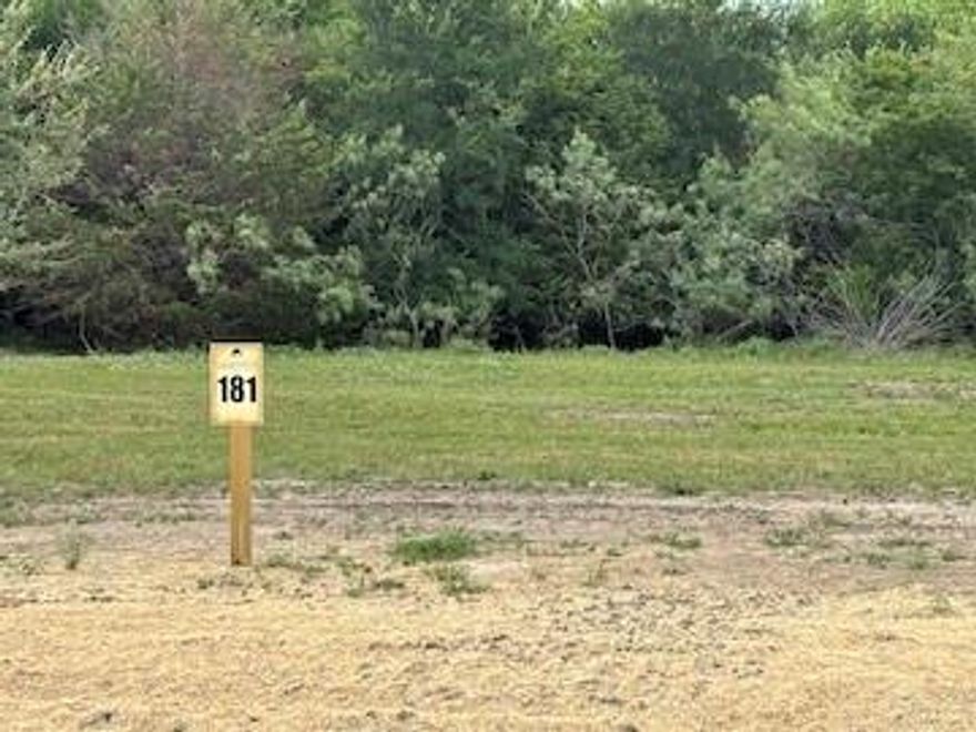 Escape to The Landings, one of the newest and most prestigious gated communities on the shores of Richland Chambers Lake. This exceptional off-water lot offers the perfect blank canvas to design and build your bespoke dream home, blending modern luxury with the timeless tranquility of lakefront living. Resort-Style Amenities feels like a permanent vacation. As a resident, you’ll enjoy exclusive access to a suite of high-end amenities designed for both relaxation and recreation. The Social Hub: A stunning clubhouse featuring a spacious gathering room, complete with a kitchenette and large-screen TV—perfect for hosting game days or community events. Active Living: Stay at the top of your game with a state-of-the-art workout facility and a dedicated pickleball court. Water & Sun: Take a dip in the sparkling community pool or spend the day on the water using the private boat launch, exclusive to residents. This isn't just a property; it’s a lifestyle upgrade. You’ll enjoy the serene, slow-paced atmosphere of the lake while remaining conveniently close to city amenities for dining, shopping, and entertainment. Whether you’re looking for a weekend retreat or a forever home, this lot provides the space and the setting to make those dreams a reality.