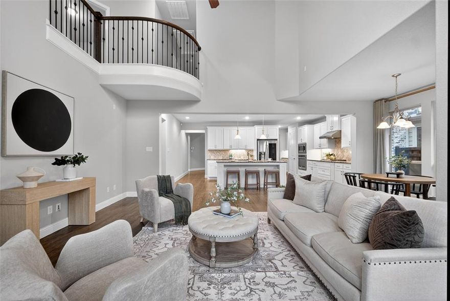 Located in the highly desirable Craig Ranch master-planned community, this beautifully maintained home at 5404 Gypsum Drive in McKinney offers the perfect blend of style, comfort, and convenience. Step inside to gorgeous hand-scraped hardwood floors that add warmth and elegance throughout the main living areas. The dramatic open-to-below living room fills the home with natural light and creates a grand, airy space perfect for entertaining.
The open-concept kitchen flows seamlessly into the living and dining areas, making it ideal for gatherings and everyday living. Recent updates include brand new carpet, fresh interior paint, a new microwave, and dishwasher, giving the home a move-in ready feel. The kitchen comes fully equipped with refrigerator included, and the home also includes washer and dryer, providing added convenience for the new owner. Enjoy cozy evenings by the gas fireplace, while the home is also pre-wired for built-in speakers, perfect for creating an immersive entertainment experience. A practical mud room adds everyday functionality for busy households. Upstairs features three spacious bedrooms, along with a dedicated media room and private office, offering flexible spaces for work, relaxation, and entertainment. Located within walking distance to the community pool, residents of Craig Ranch enjoy fantastic amenities, parks, trails, and a vibrant neighborhood atmosphere. With easy access to major highways, shopping, dining, and nearby Frisco and Plano, this home delivers both lifestyle and convenience.