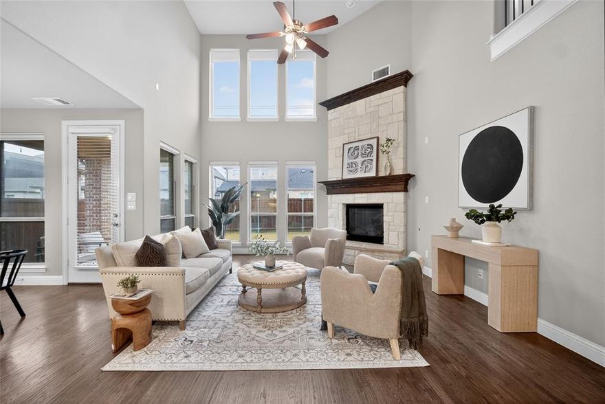 Located in the highly desirable Craig Ranch master-planned community, this beautifully maintained home at 5404 Gypsum Drive in McKinney offers the perfect blend of style, comfort, and convenience. Step inside to gorgeous hand-scraped hardwood floors that add warmth and elegance throughout the main living areas. The dramatic open-to-below living room fills the home with natural light and creates a grand, airy space perfect for entertaining.
The open-concept kitchen flows seamlessly into the living and dining areas, making it ideal for gatherings and everyday living. Recent updates include brand new carpet, fresh interior paint, a new microwave, and dishwasher, giving the home a move-in ready feel. The kitchen comes fully equipped with refrigerator included, and the home also includes washer and dryer, providing added convenience for the new owner. Enjoy cozy evenings by the gas fireplace, while the home is also pre-wired for built-in speakers, perfect for creating an immersive entertainment experience. A practical mud room adds everyday functionality for busy households. Upstairs features three spacious bedrooms, along with a dedicated media room and private office, offering flexible spaces for work, relaxation, and entertainment. Located within walking distance to the community pool, residents of Craig Ranch enjoy fantastic amenities, parks, trails, and a vibrant neighborhood atmosphere. With easy access to major highways, shopping, dining, and nearby Frisco and Plano, this home delivers both lifestyle and convenience.