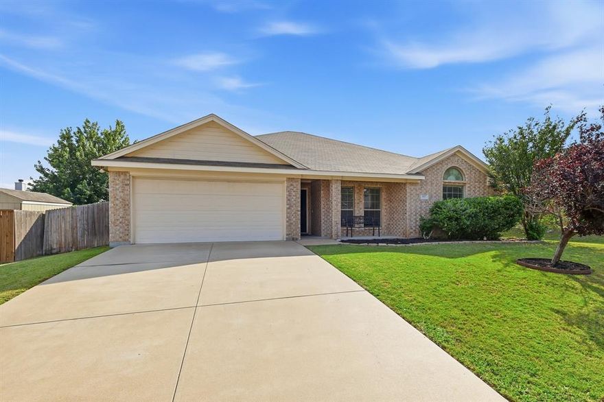Welcome home to this beautifully maintained 3-bedroom, 2-bath home in Burleson’s Elk Ridge community! Inside, you’ll find an open-concept layout with spacious living areas and a bright kitchen featuring granite countertops, stainless steel appliances, abundant cabinet space, and an island perfect for entertaining. The private primary suite offers an ensuite bath and generous closet space. Out back, enjoy the covered patio overlooking the spacious backyard- ideal for weekend BBQs, family playtime, or relaxing evenings outdoors. Conveniently located near shopping, dining, parks, and entertainment with easy access to major highways for a quick commute to Fort Worth. Whether you’re hosting friends or enjoying a quiet night at home, this move-in ready property offers the perfect blend of comfort, style, and convenience in one of Burleson’s most desirable locations.