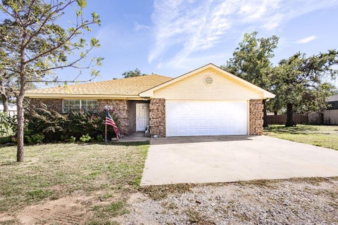 Photo of 2065 J E Woody Road, Springtown, TX 76082 (MLS # 21420568)