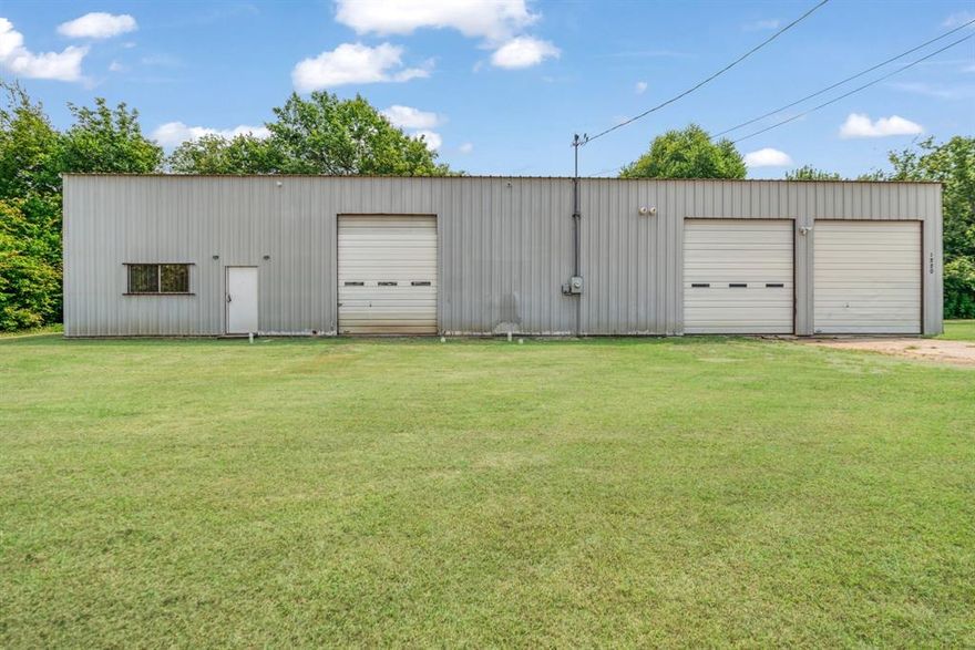 Commercial 3179 sq ft warehouse type building with office and bathroom.  So many possibilities!  Building has new 3 phase, natural gas lines, floor drain and is located on 3.65 acres between large industries like Spiral Weld, Turner Pipe, Kimberly Clark and Campbell Soup!  Located on FM thoroughfare between Bonham Street and Loop 286.  Would make a great storage facility, shop, industrial manufacturing, restaurant or anything you can imagine especially with the added acreage!