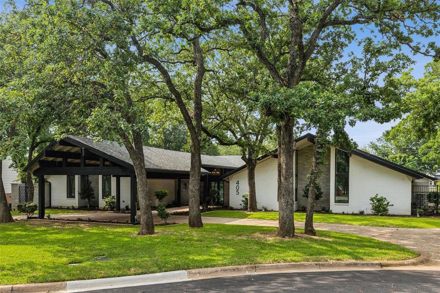 Stunning Single Story Home in the Heart of Colleyville completely remodeled.Tucked away on a tranquil cul de sac set on an expansive ¾ acre lot this exceptional 5 bedroom, 4 bathroom home offers 4,732 sqft of meticulously designed living space. Perfectly positioned within the sought after HEB school district optional enrollment in GCISD this property also enjoys proximity to elite private schools offering excellent educational options. Inside, this residence blends luxury with everyday comfort, featuring a thoughtful split bedroom layout and spacious living areas designed for both relaxation and entertaining. The oversized 2 car garage 29 x 25 with an extra wide 18' door provides plenty of space for vehicles, storage, or even a workshop. The expansive living room is highlighted by a striking 72 linear fireplace and floating shelves, opening up to the pool deck for seamless indoor outdoor living. The family room is perfect for gatherings, offering a wet bar and breakfast area, both with direct access to the pool. The fully remodeled chef’s kitchen is the heart of the home, boasting brand new high end appliances, an oversized island, and floating shelves ideal for both cooking and entertaining. A large laundry room doubles as a craft station or a convenient serving area. The luxurious primary suite is a private retreat, complete with a cozy seating area, a private patio, and a spa like bathroom with dual walk in closets. The oversized wet room with soaking tub, a separate shower, and an additional shower space, offering a true oasis for relaxation.Diving pool, a poolside cabana bar with sink, refrigerator, and icemaker connections perfect for enjoying the TX sunshine. A circular driveway, large porte cochere, redwood lined entry walkway, and motorized gate combine elegance with practicality, offering both security and curb appeal. Smart wired for modern convenience, this home is truly a Colleyville retreat private, spacious, and beautifully updated throughout.