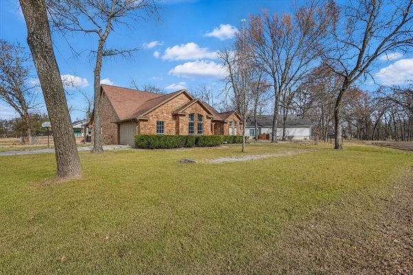 101 IDLEWOOD RD, ENCHANTED OAKS, TX 75156 - Image cfc204a42ac4f44992cebc93b43f9c5d/772653934