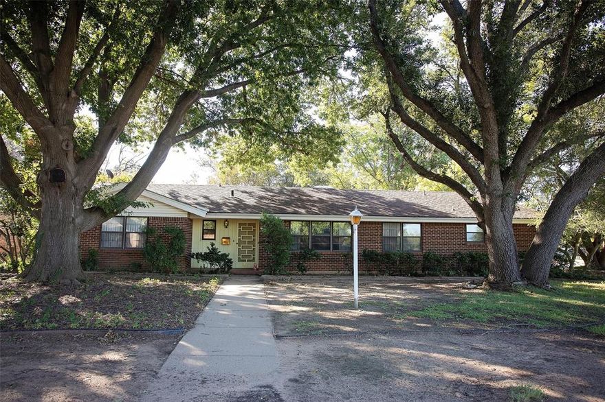 Situated on a large corner lot in one of Graham’s most established and sought-after neighborhoods, this spacious 4-bedroom, 3-bathroom home offers a welcoming blend of comfort, function, and potential. Mature shade trees and a fully fenced backyard provide a private and inviting setting, perfect for children, pets, and outdoor gatherings.
Inside, the thoughtfully designed split floor plan offers versatility for today’s families. Two bedrooms feature en-suite bathrooms, allowing for the possibility of dual primary suites-ideal for multi-generational living, guests, or a private retreat. The eat-in kitchen with optional formal dining room creates flexible spaces for both everyday meals and special occasions. A wood-burning fireplace anchors the living area, adding warmth and charm, while abundant custom built-in shelving offers storage and character throughout the home.
While some cosmetic updates could enhance the interior, the solid structure, timeless layout, and prime location make this property a rare opportunity to personalize to your taste. With its family-friendly design, desirable neighborhood, and inviting outdoor spaces, 1400 Oak Hills Drive is ready to welcome its next chapter.