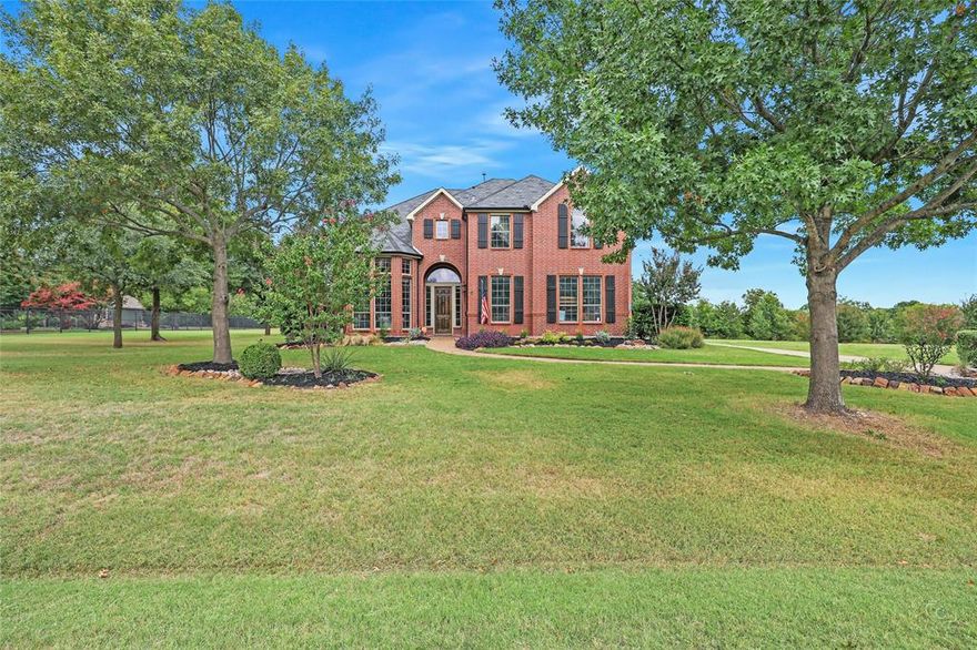 Nestled on a beautiful maintained 1 Acre lot on the heard of Fairview.  This stunning 3760 sqft home offers the perfect blend of space, comfort and upscale living.  This impressive two story residence features 4 spacious bedrooms, 3.5 baths, thoughtfully designed for both everyday living and effortless entertaining.  The primary suite is downstairs and provides a private retreat with generous proportions and a spa inspired bath, while the additional bedrooms offer flexibility for family, guests or home office.  With two expansive living areas, there's plenty of room to gather, relax and create lasting memories.  The dedicated game room adds a fun, versatile space for recreation, while the fully equipped media room sets the stage for unforgettable movie nights and game day experiences.  Media Equipment and Media Chairs included with the home.  The open concept layout flows seemlessly, complemented by abundant natural light, hard wood floors and refined finishes throughout.  The spacious kitchen features custom cabinets with tons of storage, granite counter tops, gas 5 burner cooktop with stainless steel vent hood, island and views of the backyard.  Outside the sprawling one acre property offers endless possibilities from adding a pool to creating your own outdoor oasis, all with the privacy and tranquility that make Fairview so desirable.  The property has direct access to Roadrunner Trail and Cypress Park.  Enjoy the perfect balance of peaceful country style living with 2 neighborhood ponds and convenient access to shopping, dining and top rated schools.  This exceptional property is more than a home, it's a lifestyle.