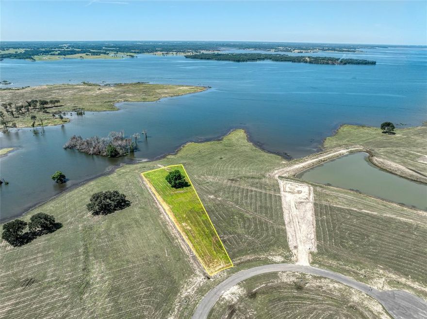 385 Sailview Ct, Lot 61 – The Peninsula at Bois d’Arc Lake
Experience lakefront living at its finest on one of the most coveted lots in the prestigious gated community of The Peninsula at Bois d’Arc Lake. Spanning 1.49 acres with breathtaking open-water views, this rare property offers direct access to the lake and is one of the few exclusive lots with dual boat slip privileges — build your own private dock on your property and enjoy a deeded, developer-installed marina slip maintained by the HOA. Whether you're dreaming of sunset cruises, weekend gatherings by the water, or building a family retreat that will echo with memories for generations, this southwest-facing lot is the perfect foundation. Just steps from planned luxury amenities, including a clubhouse, infinity pool, fitness center, and paddle launch, this homesite promises not just a home, but a lifestyle of adventure, serenity, and timeless lakefront elegance. Build your sanctuary where the water meets the sky — and where every day feels like a getaway.  Seller is Motivated.

*Buyer to verify all information*