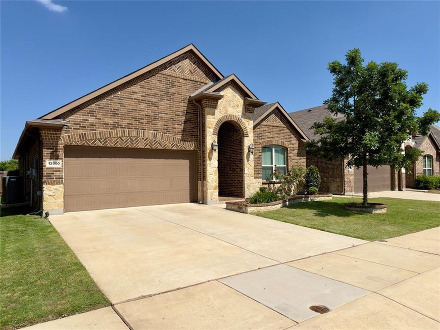 Beautifully maintained single-story home in desirable Fort Worth featuring 3 bedrooms, 2 full baths, thoughtful upgrades, and a highly functional open-concept floorplan. Stunning brick-and-stone elevation with exceptional curb appeal welcomes you into a home filled with quality finishes and pride of ownership throughout. The chef-inspired kitchen boasts granite countertops, oversized entertaining island, rich cabinetry, designer backsplash, stainless steel appliances, new Bosch dishwasher, new LG microwave, upgraded workstation sink with premium faucet, and built-in drinking water filtration system. Spacious living and dining areas make entertaining effortless. Private primary suite offers dual vanities, soaking tub, separate shower, and oversized walk-in closet. Flexible office or study or fitness space provides versatility for today’s lifestyle. Additional highlights include beautiful tile flooring in main living areas, spacious secondary bedrooms, covered patio, abundant storage, and functional single-story layout. Major recent upgrades include a premium Lennox HVAC system valued at over $15K, upgraded kitchen appliances, and modern sink-water filtration enhancements. Conveniently located near shopping, dining, schools, and major highways. This move-in ready home combines comfort, style, and valuable big-ticket upgrades that truly set it apart.