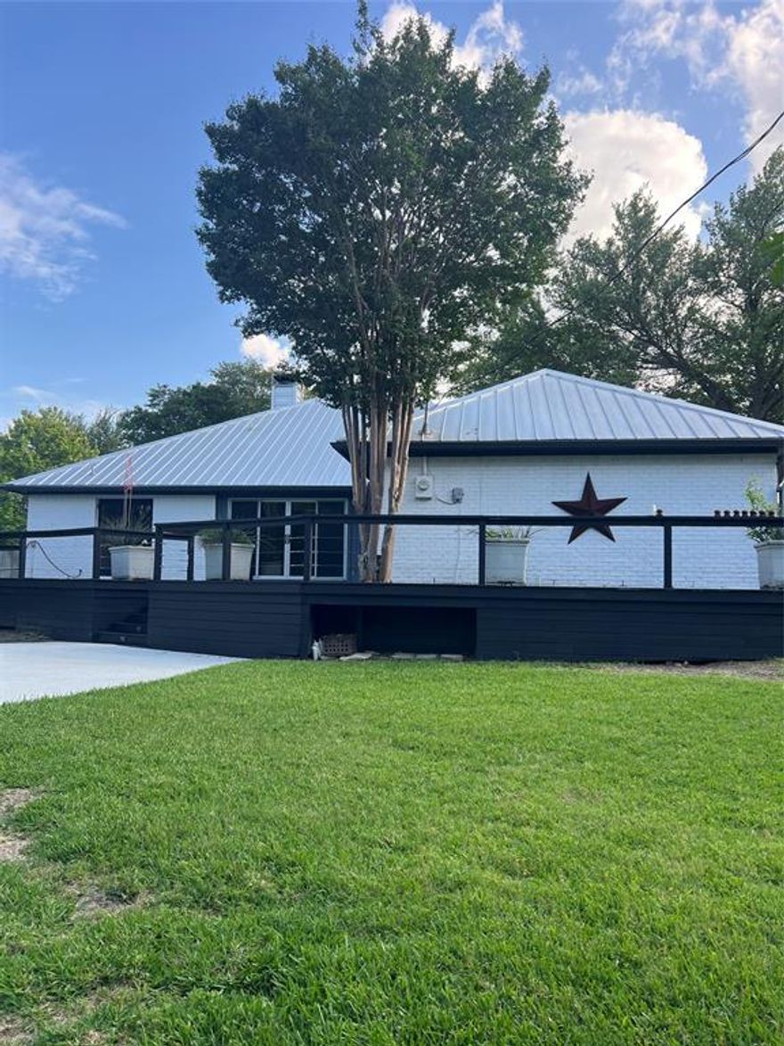 Rare almost half-acre creek retreat in North Dallas featuring a resort-style pool, lush green views, and a level of privacy that makes it feel far removed from the city. Designed for entertaining, the backyard features a massive deck overlooking the pool directly off the bar area, plus a built-in gas hookup ready for an outdoor BBQ or kitchen setup.
This beautifully updated single-story home combines comfort, style, and energy-efficient upgrades including a steel roof, tankless water heater, EV charger, gas appliances, and brand-new carpet throughout. Inside, the open-concept layout flows seamlessly into the updated kitchen with granite countertops, stainless steel appliances, and ample storage. The primary suite features a large spa-like shower and dual walk-in closets.
A unique blend of nature, entertaining, and modern living in an unbeatable North Dallas location near the Dallas North Tollway and George Bush Turnpike. Mark Wesson real estate broker has ownership interest in property.