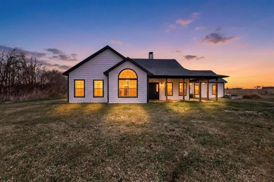 Escape to peaceful country living on this beautiful rural property sited on 3.5 acres, where space, privacy, and tranquility take center stage. With spread-out neighbors, you’ll enjoy the feeling of seclusion without sacrificing comfort. This inviting 3-bedroom, 2-bath home also offers a versatile flex space—perfect for a home office, exercise room, hobby space, or anything your lifestyle demands. The bright white kitchen delivers a clean, timeless aesthetic and provides ample cabinet space, all complemented by brand-new Frigidaire appliances installed in August 2025, including a side-by-side refrigerator, 5-burner gas stove, dishwasher, and over-the-range microwave. Large windows throughout the home allow natural light to pour in, creating a warm and airy atmosphere. Recent updates provide peace of mind, including a brand-new HVAC system (June 2024), a tankless water heater upgrade (2021), and a new 30-year architectural roof added in August 2025. The aerobic septic system was updated in November 2025 with new control panels and sprinkler lines, and both the hall bath and primary bath feature newly installed walk-in showers (December 2025). This thoughtfully updated home offers the perfect blend of modern convenience and rural serenity—ready for you to enjoy wide-open space and relaxed living. Discounted rate options and no lender fee future refinancing may be available for qualified buyers of this home.