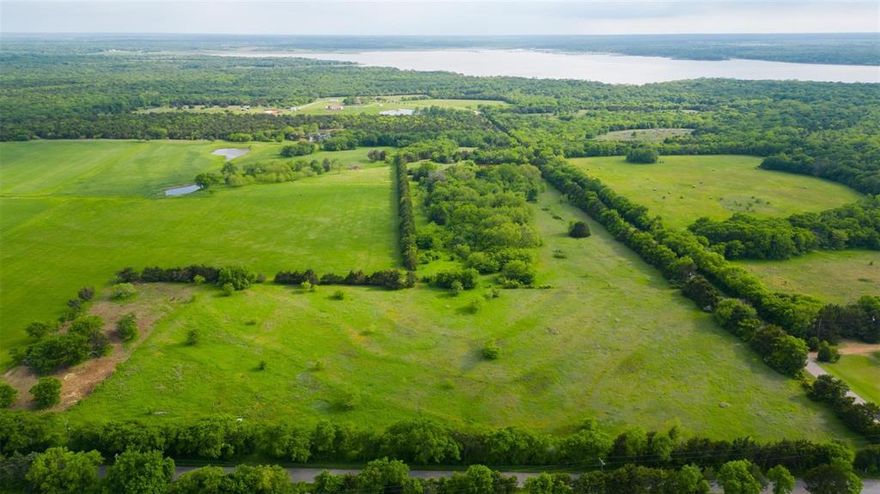 Ready for Lake Life? It's ready for you, here at Lake Texoma! This land offers the best of everything to get you started on building a dream home with wide open spaces. Clean, level land with electric available, and the best part is accessible road frontage on Flowing Wells. Retreat into beautiful greenery and trees. Full time living or weekend retreat this is the place to be. All re plat is complete and Deed restriction will be finalized with minimum square footage and few restrictions. Flowing Wells Marina is exactly 1 mile away along with groceries, shopping and schools nearby. Corp property is adjacent and close to Hagerman Preserve. No mobiles allowed. Inquire about Builder referral or bring your own builder.