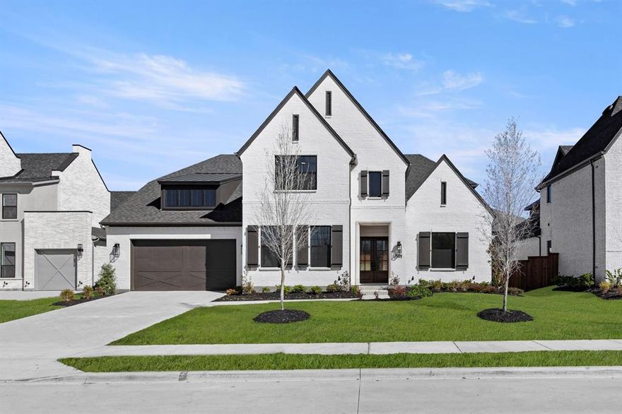 MLS# 21213311 - Built by Tradition Homes - Ready Now! ~ Ideal light color painted brick house with black shingles and black windows. Welcoming 19’ entry with a curved staircase. The Chef’s kitchen includes a large island, KitchenAid gas rangetop, double ovens, Blanco single undermount sink and quartz countertops. The luxurious owner’s bath includes a freestanding tub, large separate vanities and walk-through from the owner’s closet that leads to the laundry room. Every bedroom includes an ensuite bath and large closet.