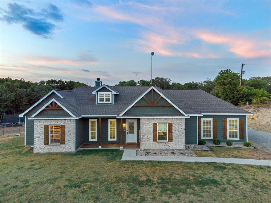 This is what Texas is all about; breathtaking sunsets, room to roam, and a beautiful home to share with family and friends. This four-bedroom two bath craftsman-style home sits near the back of a ten-acre lot, has stained concrete floors, granite countertops, and 9-foot ceilings throughout. Two spacious walk-in closets in master bedroom. Tiled, walk-in shower in master bath.  Two separate pastures fenced with horse or goat fence and large fenced backyard (Make sure and take a look at the spacious pasture at the front of the property that could serve well for grazing livestock). Large run-in shed for horses or livestock. 12 x 10 storage shed. The beverage cooler will convey with the property. Come claim your slice of Texas today.