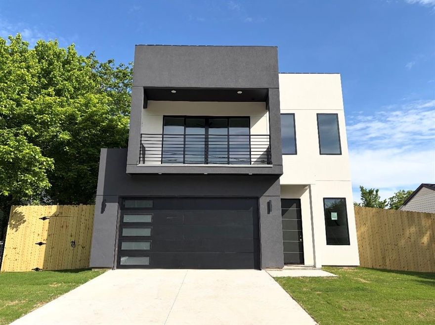 **WELCOME HOME** Where luxury meets modern comfort! This stunning 4-bedroom, 2.5-bathroom residence offers 2,063 square feet of beautifully designed living space, perfectly situated on a spacious corner lot with rear-entry parking. Step inside to soaring 10-foot ceilings, an open-concept floor plan, and modern finishes throughout. The chef-inspired kitchen features sleek quartz countertops, ample cabinetry, and seamless flow into the living and dining areas—ideal for entertaining. An appliance package including an electric range, dishwasher, and microwave is included. The living room fireplace adds warmth and charm, while glass staircase railings provide a striking contemporary touch. All four bedrooms offer both privacy and functionality. The primary suite is a true retreat, featuring an oversized dual shower with a soaker tub combination for a spa-like experience. Additional highlights include a dedicated laundry room with countertop space, a stylish mudroom, and abundant natural light throughout. Located just minutes from downtown Dallas, this thoughtfully designed home blends comfort, sophistication, and space. Schedule your private showing today and come see one of my jewels!