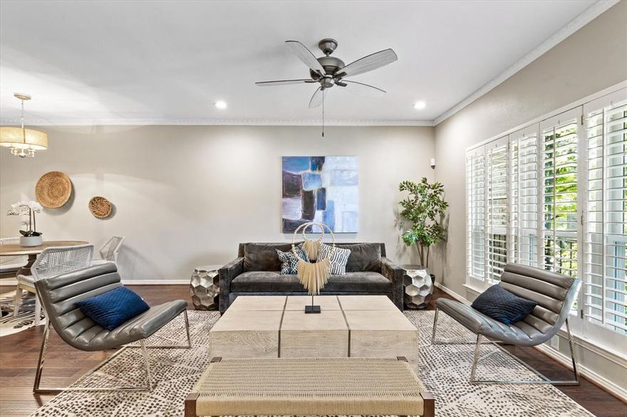 I am in love with this unique floor plan with the large combination living and dining with a fireplace plus a dry bar with wine fridge. The kitchen with its granite countertops and breakfast bar is open to the second living area (that used to be the third bedroom) with French doors opening onto a covered back porch. Views to the community pool from this large, covered porch expand the outdoor enjoyment from this charming living area. The primary bedroom is well sized with ensuite bathroom and large closet with built in drawers. The second bedroom, private from the primary with a full bath just off the hallway. Stacked washer-dryer remain in laundry room with extra storage space. Walking distance from shopping, dining, parks and river trails enhances the enjoyment of this fabulous condo. So much outdoor living without the upkeep of a yard and pool. Do not let being on Bellaire stop you from seeing this beautiful property- there is very little noise inside the condo, and you get to enjoy the manicured front yard. Condo is also for lease