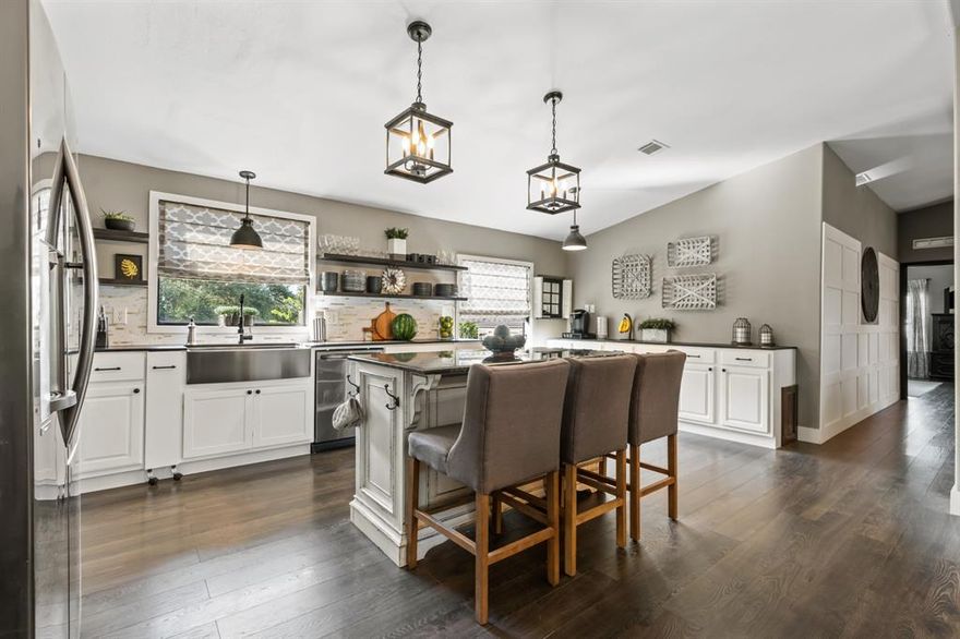 MUST SEE FULLY REMODELED, secluded home at the end of a quiet road!  Come home to comfort and privacy nestled near the shores of Lake Whitney!  Unbeatable location in a well known desired community with a picturesque view of open pasture from the back yard creating a peaceful, private ambiance to be enjoyed year round.  Thoughtfully remodeled with care and attention, this home combines comfort and luxury throughout.  Impressive presence with double sided wood burning fireplace that can be viewed from formal dining AND living area. Adorned with special touches throughout, most notable the custom wainscoting wall!  Master suite features a sitting room, large soaking tub, dual sinks with Carrera marble tops, and separate shower. The kitchen is fresh and clean with new appliances, farm sink, custom vent-hood, coffee bar, storage galore-all connected to the dining area and centered around the island! Bedrooms 3 & 4 are connected with a Jack and Jill bathroom.  With 4 bedrooms & 3 full bathrooms, there is room for everyone! You will find all major components are in tip top shape.  With close proximity to the best recreational lake near DFW, this is perfect for anyone seeking a private retreat close to the water whether private residence, rental, or seasonal lake home!