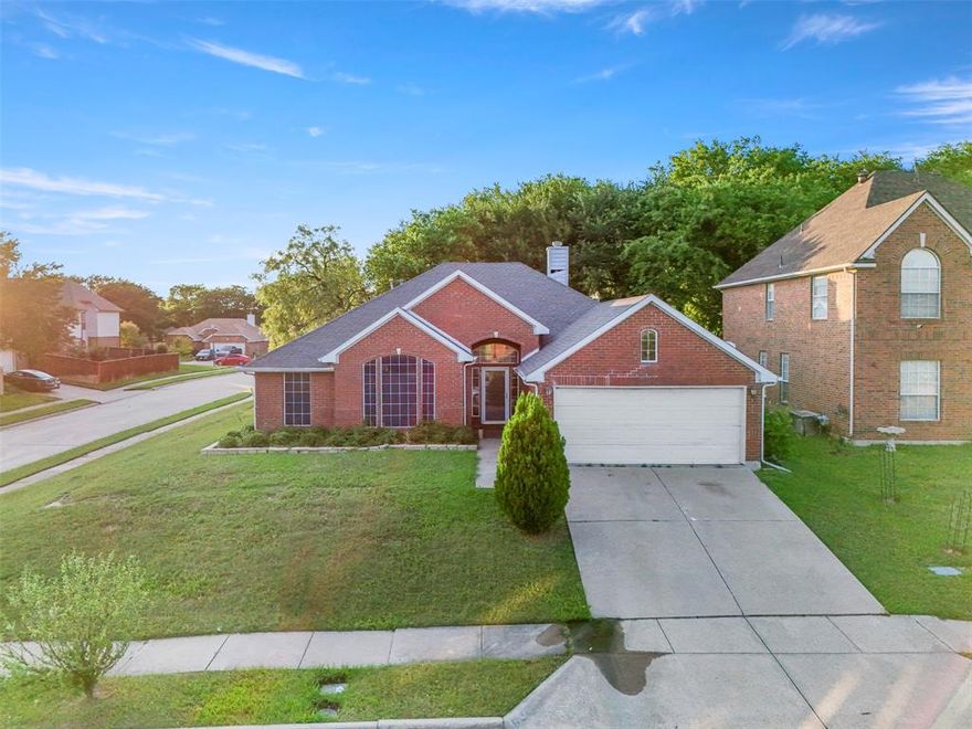 Welcome to a home that gives you the space to grow, entertain, and truly settle into the lifestyle you’ve been searching for. Situated on a large corner lot in the established Wind Ridge subdivision, this thoughtfully renovated 4-bedroom, 2-bath home blends comfort, functionality, and everyday convenience.

Inside, you’ll immediately appreciate the spacious layout designed for both relaxing evenings and effortless entertaining. The expansive living area flows seamlessly into the kitchen, where an extended island, wet bar, and open sightlines create the perfect setup for hosting family or casual relaxation. Natural gathering spaces continue with both a formal dining room accented by a chandelier and a bright breakfast area ideal for morning coffee or busy weekday routines.

The oversized primary suite offers a peaceful retreat with a separate shower and plenty of room to unwind at the end of the day. Three additional spacious bedrooms provide flexibility for growing families, guests, home offices, or hobby spaces. Thoughtful updates throughout the home help create a move-in ready experience so you can spend less time worrying about projects and more time enjoying your new space.

Outside, the large corner lot gives you extra breathing room and endless possibilities for outdoor living, play, gardening, or future customization. The location offers quick access to I-20 and Highway 408, making commuting across the DFW metroplex simple and convenient. Whether you’re a first-time homebuyer, relocating to DFW, or simply looking for more space to fit your lifestyle, this home delivers the comfort you’ve been waiting for.