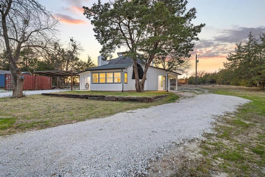 This BEAUTIFUL TWO STORY, GEODESIC DOME HOME ON 1 NATURISTIC ACRE, offers 3 or 4 bedrooms, and 2.5 baths. The open kitchen,dining, living-room and primary are downstairs with additional bedrooms and bonus-office space upstairs. Home features easy to maintain LVP flooring throughout the first floor and carpet upstairs. The open floor plan gives the home a wide open and welcoming feeling. Large laundry-Utility room with hook-up's, tankless water heater, easy to access water line pec system in utility room closet and large pantry. Kitchen is stylish with gray cabinets and beautiful solid oak countertops and stainless appliances. Living area is spacious allowing open vision of all areas downstairs and a visual glimpse of upstairs thru the unique dome design this home offers. This home is ultra efficient and heats and cools using minimal energy. Located on 1 acre in a very nice, established neighborhood with wonderful neighbors. You will love the evening sunsets from the large, covered porch. PLEASE NOTE, Additional acre, parcel ID#434456 can be purchased to enhance the size of the property at additional cost to buyer. The connecting property ID#434456 mentioned,has a well in the front corner under the amazing mature trees as shown in pictures.
Backyard is a wide-open area with room for a shop in-ground pool and a garden. This dome home is engineered to withstand 250 mph winds and includes fortified rooms for tornado protection. Come look at one of Whitewright's most unique and economical homes. 
Buyer and or Buyer's Rep to verify any and all information pertaining to this property. Information of this home's construction can be viewed at New Age Dome Construction.     Professional photos incl drone pics to be added Tuesday 1-13-26.  This property is a MUST SEE !!