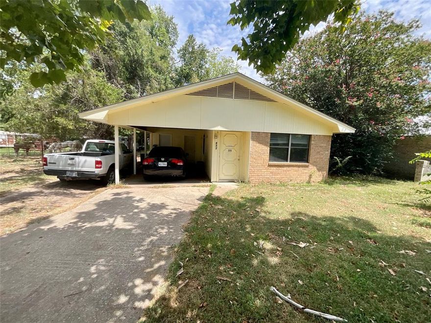 SELLER IS MOTIVATED – PRICED TO SELL QUICKLY!

Investor special, first-time buyer opportunity, or the perfect downsize — this well-maintained 2-bedroom, 1-bath brick home is full of potential and value! Whether you're looking to expand your rental portfolio, purchase your first home with an FHA 203(k) loan, or simplify into a manageable, all-electric space, this property fits the bill.

The roof was replaced just 2 years and 6 months ago, offering peace of mind and saving you big upfront. With a durable brick exterior, double-pane windows, and tiled flooring throughout, this home is built for low-maintenance living. Inside, you'll also find a roomy laundry area and a newer HVAC system.

Bonus: A home warranty is already in place and will transfer to the new buyer at closing — added protection and value!

A storage building is conveniently located inside the carport area, perfect for extra tools, holiday decorations, or anything you want tucked away but close at hand.

This is an ideal candidate for FHA 203(k) renovation financing — refresh the interior, update the kitchen or bath, and build instant equity. Investors will appreciate the rental potential and ease of upkeep, while homeowners will love the chance to make it their own.

All-electric. Great location. Low-maintenance. Move-in ready.

This property may be subject to lender approval due to mortgage balance. Please contact agent for details.

Affordable homes with this kind of structure, flexibility, and peace-of-mind extras don't last long. Come take a look and imagine the possibilities!