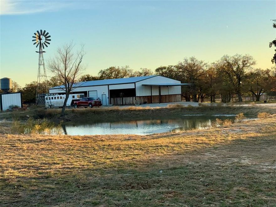 Hico Texas Horse Property! Horse trainers and collectors... This one is for you! Quiet and secluded Fully Loaded 35 Acre Horse property.  Peppered with some of the prettiest live and post oaks you will see. Fenced and cross fence with the majority of fencing being 5 ft top rail and no climb. Barn includes 12 stalls (13x15 measurements) all with auto waters, Wash rack with Hot water, therapy stock, 2 RV Plugs, Large front porch, separate blanket and storage shed, feedroom with a large roll up door, and a tackroom. 6 turnout traps with sheds, calf lane, and 2 riding areas. Enjoy the early mornings or late nights sitting on the porch listening to the critters sing while your horses are peacefully sleeping.  2 excellent water wells 20 and 25 GPM plus multiple tanks. The house is a spacious 2 bedroom 2 bath metal home complimented with a large breakfast island, oversize rooms, and views looking out the windows. Perfectly designed large tank out from the front porch. Deep enough to free swim a horse across it. Enjoy the abundance of wildlife including ducks, turkeys, deer, birds and bull frogs. You'll view some of the prettiest sunrise and sunsets and see how big the Stars above Texas really are. If this home is not big enough there is the perfect spot to build your forever dream home. Finish out your way to have your piece of heaven in the Cowboy Capital of The World!