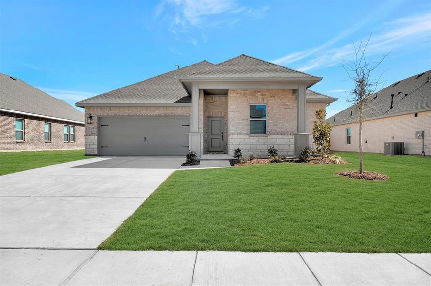 From dawn to dusk and from outside-in, this home is a showstopper! Located in Van Alstyne, Texas and zoned to Van Alstyne ISD, this single-story Goldenrod II features a stunning brick exterior with stone accents, beautiful landscaping, and an open concept floorplan. Off the foyer are two convenient secondary bedrooms and a full bath in between. At the back of the home is the inviting kitchen, great room, and dining area. With stylish grey shaker cabinets and quartz counters lit by black metal shade pendant lights, the kitchen is one to love for years to come. The primary suite and bath will have any homeowner feeling spoiled with the expansive walk-in closet and spacious shower.
