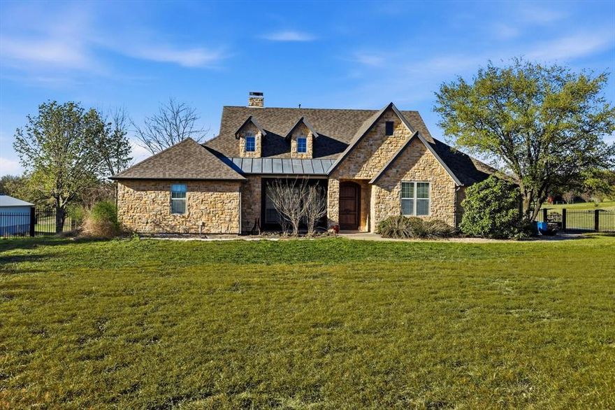 Welcome to 4505 County Road 408 in northwest McKinney, where peaceful country living meets convenient access to the city. Situated on 3.5+ beautiful acres, this stunning property offers privacy, space, and versatility with a large 2,000 sqft 40'x50' with 14'x14' garage door workshop - perfect for hobbies, business use, equipment storage, or recreational vehicles.

The home showcases warm stone and wood finishes that create a timeless, inviting feel throughout. Inside, you’ll find spacious living areas designed for both everyday comfort and entertaining. Large windows bring in natural light and provide scenic views of the surrounding acreage.

Step outside to the back patio overlooking a lush, green backyard, ideal for relaxing evenings, outdoor dining, or simply enjoying the peaceful setting and wide-open spaces.

The expansive property provides plenty of room for outdoor activities, gardening, animals, or future additions, all while maintaining the privacy and tranquility of country living.

Despite the serene setting, the home offers convenient access to nearby destinations:
• ~10 minutes to Historic Downtown McKinney Square
• ~12 minutes to McKinney National Airport
• ~15 minutes to US Highway 75
• ~18 minutes to Sam Rayburn Tollway (SH-121)

This rare property offers the perfect balance of acreage, functionality, and proximity to McKinney’s dining, shopping, and commuting routes.