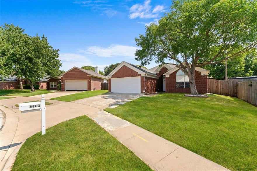 Beautiful brick home with ceramic tile in kitchen and bathrooms and wood floors in living room and bedrooms. Master bedroom has large walk in closet, double sink vanities, and a garden tub with a separate stand in shower. Home also has its own utility room and a huge backyard!! Amazing location with I-20, 820 and 287 all just minutes away... you'll have Mansfield, Downtown Fort Worth, Kennedale, and Dalworthington Gardens right at your finger tips! Being in a Superb school district, and having an array of parks and shops nearby is just cherry on top! Don't miss out and make this home yours!