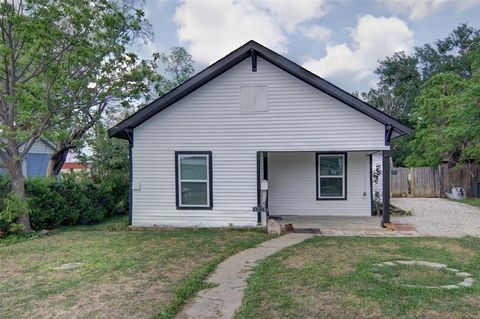 Photo of 402 W Trammell Avenue, Everman, TX 76140 (MLS # 21243835)