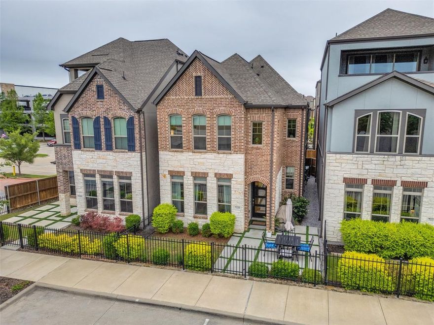 Barely lived-in David Weekley just steps from White Rock Creek Trail! Luxury vinyl plank, designer wallpaper, modern palette and tons of natural light throughout. First floor sports a gourmet kitchen with quartz countertops, island, bar seating, gas cooktop, built-in microwave and stainless steel appliances. Living room is wired for surround sound and has a wall of windows (app-remote controlled blinds). Coffee bar, guest bath and loads of under-stair storage round out the first floor. Upstairs features a humongous primary suite with wall of app-remote controlled blinds, tray ceiling, separate vanities, seamless glass tiled shower and large walk-in closet with built-ins. Generously sized secondary bedrooms, both with walk-in closets and ceiling fans, share a loft game-room area — perfect for home-office or exercise area. Drink your morning coffee or grill for family and friends in your private front courtyard, plumbed for gas. Neighborhood has two dog parks and you can walk 100 steps to Sprouts for groceries, Starbucks for caffeine, First Watch for brunch or Fish City Grill for dinner!
