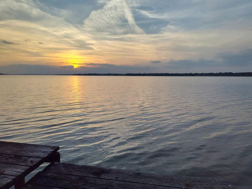 Experience the most incredible sunsets from this open water lakefront lot on Cedar Creek Lake! Gently sloping to the waters edge, full of mature trees and ready to build the lake house of your imagination all in an unincorporated location. Previous residence was removed and the boat house remains for your immediate enjoyment. Easy access to Gun Barrel City and Hwy 175. One hour to Downtown Dallas.