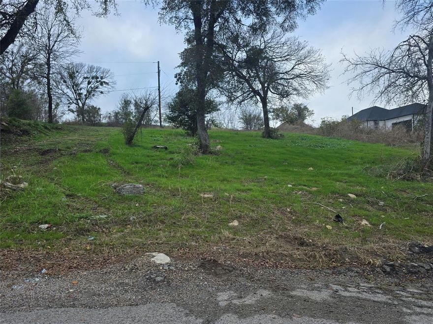 This property is well located but there is no sewer line on the street and it would be approximate 300 feet to extend to one.