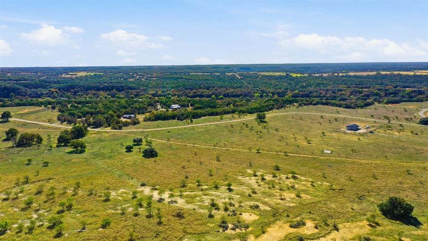 Come and see your slice of the country in Palo Pinto Country. Prime 5 acre tract ready for your home, shop, family, and animals. A true blank canvas with a gentle roll North to the rear of the lot that affords you plenty of space to grow into the new community with the best views. Come and grow your roots here and witness the rolling hills of Palo Pinto County with the backdrop of the most gorgeous sunrises and sunsets. Welcome to Texas, Welcome Home.