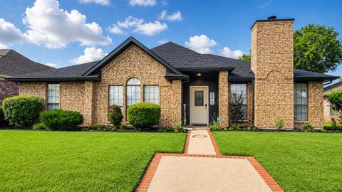 Photo of 8517 Manchester Drive, Rowlett, TX 75089 (MLS # 21289789)