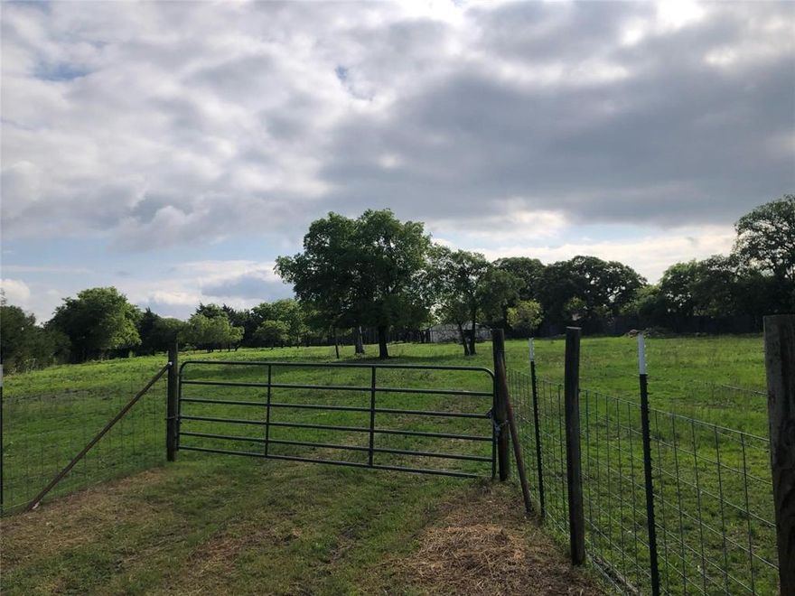 4.89 Acres at intersection of Seagoville Road and Beltline Road. The front 1.5 Acres are zoned commercial and the back 3.5 acres are zoned for residential. Lots of trees and big pond on the the property. This is a great building site!