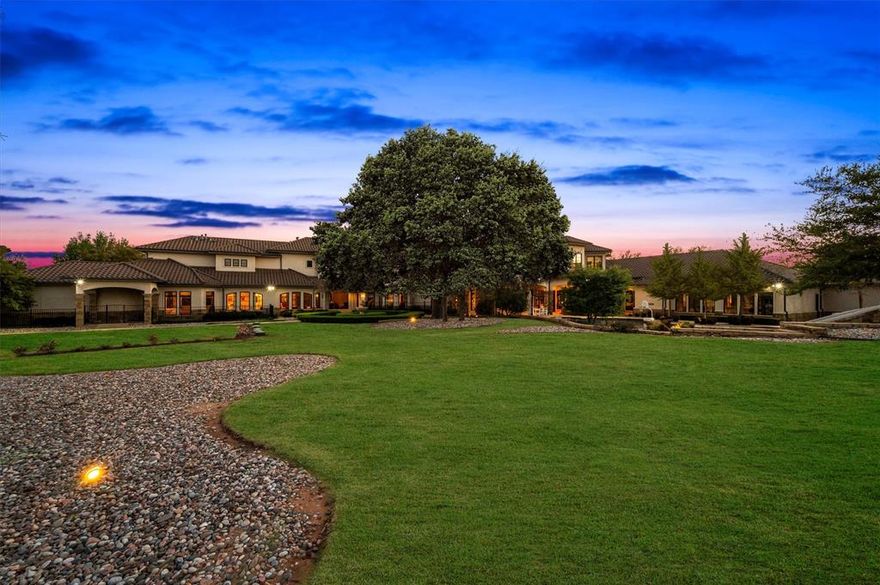 Southlake Estate Unlike Anything Else! 4.83 Acres of Private, Resort-Style Living. Extraordinary estate is a rare expression of scale, sophistication, & design, crafted for those who expect nothing less than exceptional. Grand circular drive & stately motor court set the tone for what lies beyond, an estate where every detail is curated to deliver a lifestyle few properties can offer. Inside, timeless architecture meets modern refinement, with an elevator providing access throughout & living spaces designed to impress yet feel effortlessly livable. Built for both entertaining & everyday living, the entertainment wing features a game room with wet bar & tiered theater, while dual executive offices & gym create the perfect balance. The chef’s kitchen is nothing short of extraordinary, equipped with commercial-grade gas appliances, dual dishwashers, built-in refrigeration, double ovens, warming & cooling drawers, plus a butler’s pantry & walk-in pantry designed to accommodate gatherings on any scale. The Owner’s Retreat is a sanctuary, offering a serene escape with a spa-inspired bath, expansive custom wardrobes, & a level of privacy & tranquility rarely found. Two main-level guest suites provide exceptional accommodations, while the upper-level features 5 additional en-suite bedrooms & multiple living spaces designed for flexibility & comfort. Outdoors, the estate transforms into a private resort—an oversized pool & spa, multiple covered lounge areas, full outdoor kitchen, & a striking stone fireplace create an unparalleled setting for year-round entertaining. The indoor sports court, adaptable for 2–3 pickleball courts, adds a rare & coveted amenity, completing a lifestyle experience that is both dynamic & indulgent. With a 6-car garage, impeccable craftsmanship throughout, this estate represents a compelling opportunity at its offering price, delivering extraordinary value for its scale, privacy, & unmatched features. Attributes & additional information in docs.