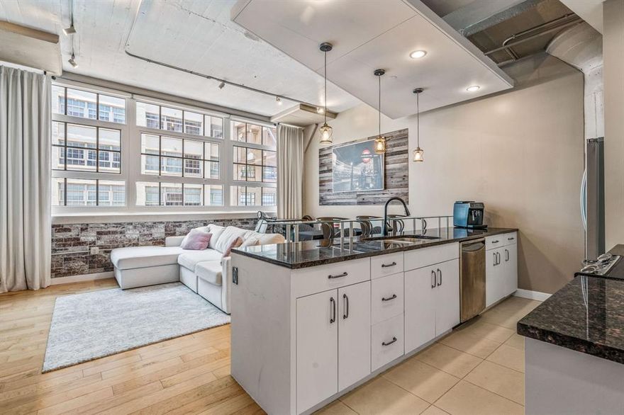 Welcome to luxury living in the heart of Fort Worth! This beautifully appointed condo offers an unbeatable location near the Cultural District, Dickies Arena, Will Rogers Coliseum, Fort Worth Zoo, and the Botanic Gardens—plus countless shops and dining options just moments away. Inside, you’ll find a smartly designed floor plan that begins with a private guest bedroom featuring its own ensuite bath—perfect for visitors or a home office. The stylish kitchen features stainless steel appliances, sleek built-in cabinetry, and ample counter space, along with a convenient built-in desk area for productivity at home. The open-concept living area is ideal for entertaining or relaxing, with electronically controlled window treatments for ultimate comfort and ease. The spacious primary suite is a true retreat, complete with a spa-inspired ensuite bath, dual sinks, walk-in shower, and generous closet space. Montgomery Plaza residents enjoy access to world-class amenities including a rooftop pool and spa, outdoor kitchen and grill areas, cabanas, putting green, corn hole, media room, indoor lounge, first-class fitness center, gated dog walk, and 24-hour concierge and security. Don’t miss this rare opportunity to own a piece of Fort Worth luxury—schedule your showing today!