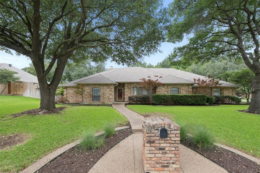 Welcome home to your all brick home on an expansive lot in the established Candleridge addition! Beautiful one-story home featuring 4 bedrooms, 3 bathrooms, and 3,239 square feet with a desirable split-bedroom floorplan. This spacious home offers an open-concept layout with three living areas, providing flexibility for entertaining, a game room, home office, or media space. The renovated kitchen showcases gorgeous granite countertops, marble flooring, and an ideal flow into the main living areas, making it perfect for everyday living and hosting guests. Large windows fill the home with natural light and highlight the mature trees surrounding the property. Step outside to a relaxing wood patio deck and slate covered patio overlooking the private backyard shaded by large trees. Additional highlights include a rear-entry garage, generous room sizes, plenty of closets, and a functional layout designed for comfort and convenience. The primary suite is at the rear of the home with an en suite bath including a large glass shower, white ceramic soaking tub, separate vanities, and separate closets. Grab your favorite realtor today for a showing! All listing information is deemed reliable, however agent or buyer to perform due diligence on square feet, room size, schools, and current condition.