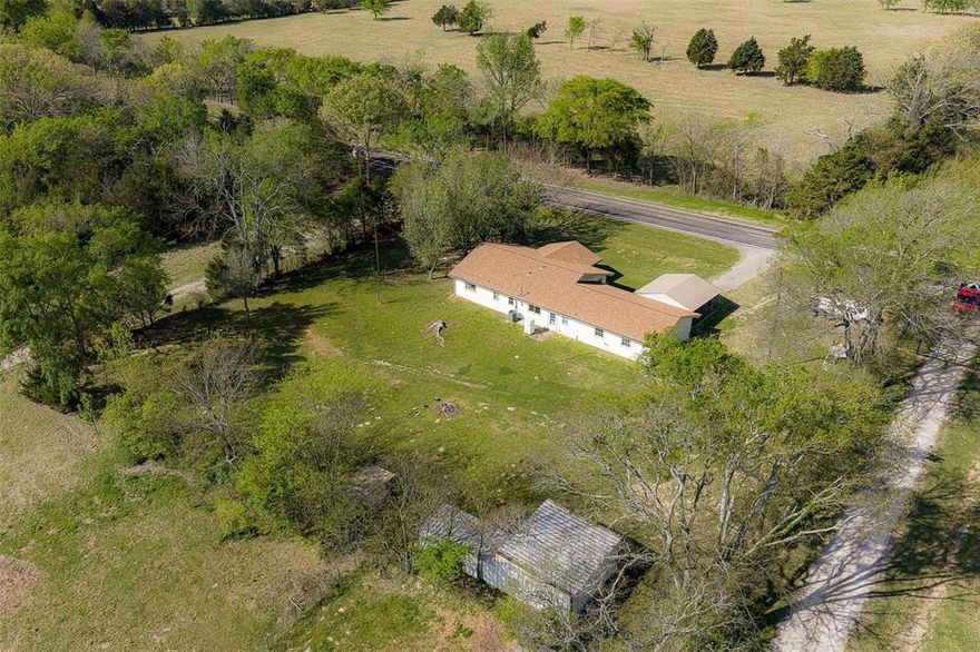 Located just outside of Ben Wheeler in the highly regarded Van Independent School District, this property combines the ease of country living with convenient access to nearby amenities. Set on 1 acre with approximately 210 feet of frontage along State Highway 773, it offers a balance of accessibility and a peaceful rural setting—just one mile from Ben Wheeler, 9 miles from Van schools, and only 12 miles from Canton First Monday Trade Days. The home includes 5 bedrooms and 3 bathrooms, providing ample space for a growing family or adaptable living arrangements. Two separate living areas create flexibility for entertaining, relaxing, or setting up a home office or game room. The exterior features durable, low-maintenance vinyl siding, along with a metal two-car carport for convenient covered parking. A barn or animal shelter sits behind the home, making the property ideal for those interested in livestock, hobbies, or agricultural use. With open, usable acreage, it’s well-suited for FFA or 4-H projects, or simply enjoying a few animals. All appliances will convey, offering a move-in ready opportunity with room to expand. Whether you’re searching for a full-time residence, short or long term rental, or a place to pursue projects, this property delivers a comfortable blend of rural character and everyday convenience. Make your showing appointment today.