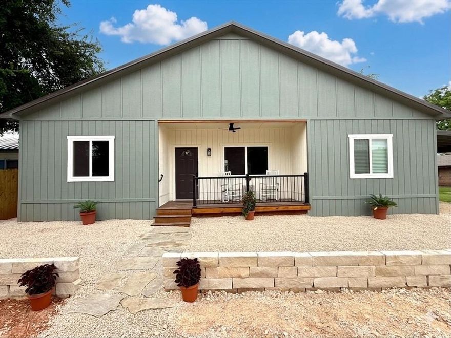 FRESHLY ADDED: Carport, backyard sod, and xeriscaped front yard with driveway wall and stepping stone sidewalks! Beautifully crafted new construction in the heart of Iredell, TX - just minutes from Hico! This thoughtfully designed 3-bedroom, 2-bath home offers approximately 1,400 sq ft of modern comfort and functionality. Step inside to an inviting open-concept layout filled with natural light, showcasing a stunning kitchen with granite countertops, ample cabinetry, and sleek finishes, perfect for both everyday living and entertaining.

The split floorplan provides privacy, with a spacious primary suite featuring dual closets and a walk-in shower. On the opposite side, you’ll find two generous secondary bedrooms and a well-appointed guest bath. A convenient mudroom and laundry area sits just off the side parking driveway, adding everyday practicality.

Built with solid, energy-efficient construction - details available upon request. 

Don’t miss this opportunity to own a brand-new home in a charming small-town setting. Schedule your showing today!