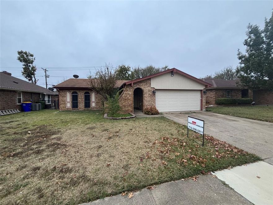 Classic brick and wood 3 bedroom 2 bath home with landscaping in front and back yards, terraced back yard with covered patio and wood fence, central air conditioning and heating with vaulted ceiling in living area and a brick wood burning fireplace, granite countertops in kitchen, electric oven, dishwasher, disposer,