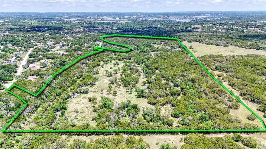 Rare find! Completely untouched and clean land. No easements or zoning in place. Coop Water and Electricity already in place on both sides of the property. Perfect location for a housing development.

Discover an exceptional opportunity to own a stunning 49+ acre parcel of land right outside the Granbury city limits. This expansive property features varied terrain and topography, offering a perfect blend of natural beauty and practical utility.

The land boasts a mix of wooded areas and cleared spaces, catering to various uses and providing breathtaking vistas. A picturesque creek runs the entire northern perimeter of the property, enhancing the natural charm of the landscape and providing a barrier from others. 

Whether you envision a hunting retreat, a thriving ranch, or a new housing development, this property offers unlimited potential to bring your vision to life.